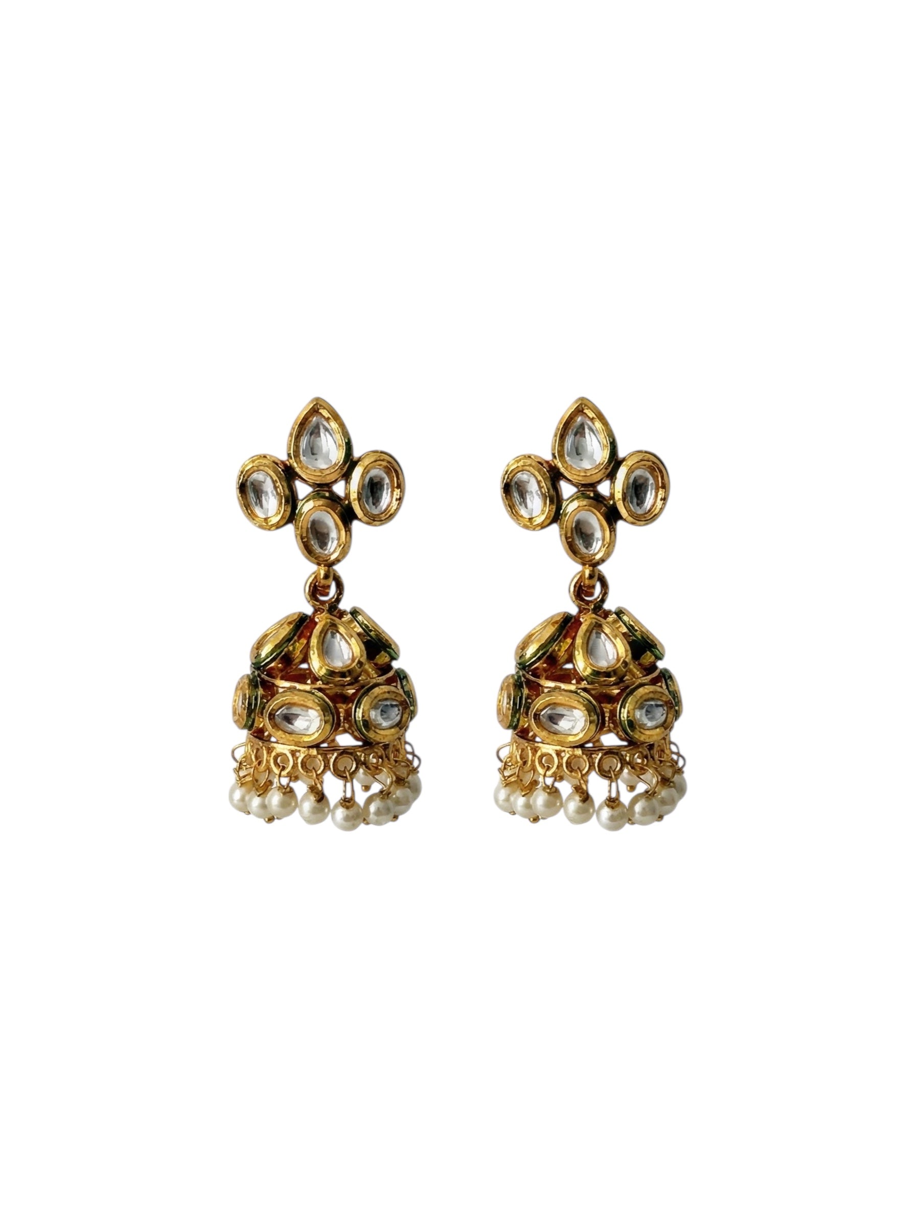 Gold plated Kundan Jhumka earrings with white Polki stones and dangling pearl beads on a white background.
